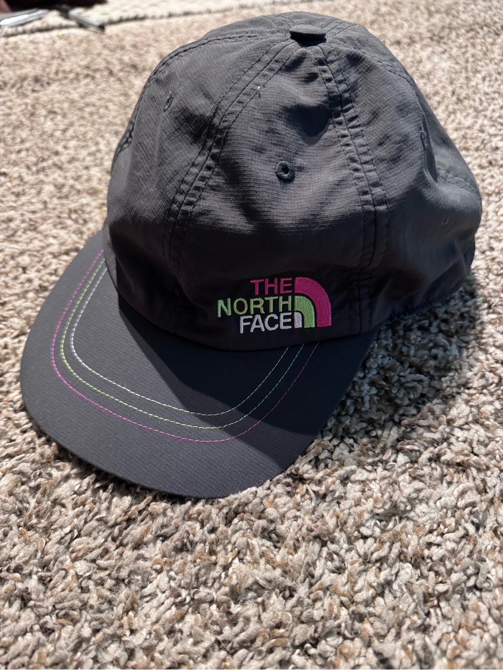 The North Face Black Cap with Pink & Green Logo Accent